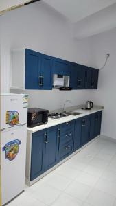 Køkken eller tekøkken på تاج الخالدية للشقق المفروشه