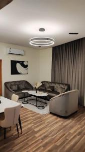 Et opholdsområde på تاج الخالدية للشقق المفروشه