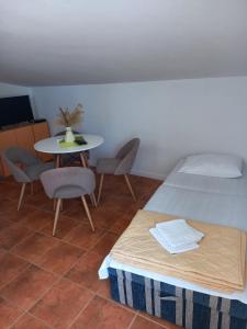 Postel nebo postele na pokoji v ubytování Vila Lazovic