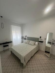 Postel nebo postele na pokoji v ubytování Hospédate con Teo