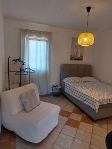 Postel nebo postele na pokoji v ubytování Apartmani Tolić