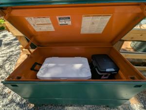 an orange box with a white object in it at Big Woods Retreat in Miramonte