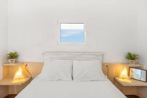 Ένα ή περισσότερα κρεβάτια σε δωμάτιο στο Sa Calma where the sea begins