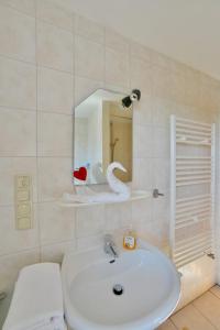 Ένα μπάνιο στο Ferienwohnung Milow