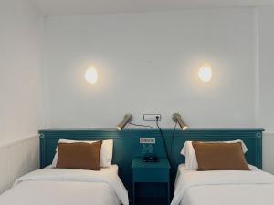 Postel nebo postele na pokoji v ubytování Hotel Agur