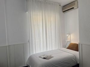 Postel nebo postele na pokoji v ubytování Hotel Agur
