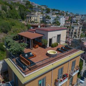 a house with a roof with a gazebo on it at Suite Posillipo 298 in Naples