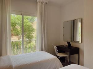 Postel nebo postele na pokoji v ubytování Hotel Agur