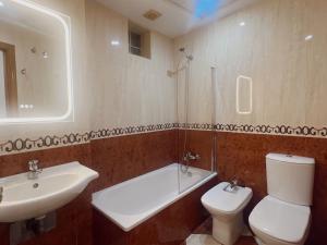 Koupelna v ubytování Hotel Agur