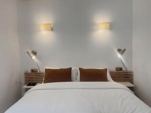 Postel nebo postele na pokoji v ubytování Hotel Agur