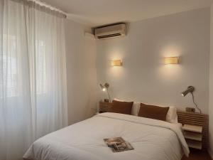 Postel nebo postele na pokoji v ubytování Hotel Agur