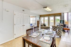 a dining room with a table and chairs at Swim, Fish and Suntan Cozy Corpus Christi Retreat in Corpus Christi