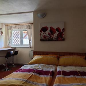 Postel nebo postele na pokoji v ubytování Apartmány Potok