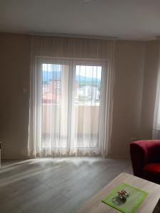 Posezení v ubytování Apartmani Loznica