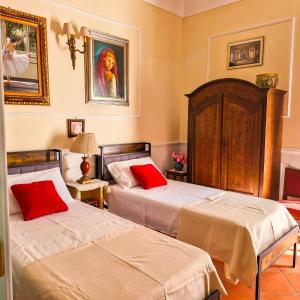 Posteľ alebo postele v izbe v ubytovaní La casa di Dante + 37 fotografií