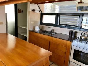 Køkken eller tekøkken på Casa Carlos Paz Terrazas del Lago