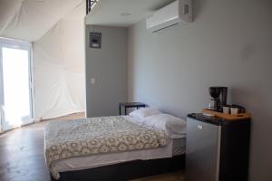 Postel nebo postele na pokoji v ubytování ThauRana Glamping