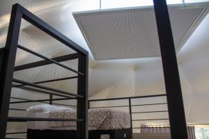 Postel nebo postele na pokoji v ubytování ThauRana Glamping