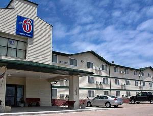 a hotel with a car parked in front of it at Americas Best Value Inn Jefferson City in Jefferson City