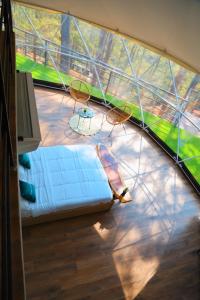 Postel nebo postele na pokoji v ubytování ThauRana Glamping + 22 fotografií