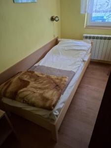 Posteľ alebo postele v izbe v ubytovaní Roman Tarnawa "Nasz Domek"