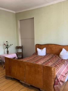 Una cama o camas en una habitación de Lorenzo Budget Hostel