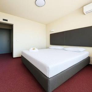 Postel nebo postele na pokoji v ubytování Almaris