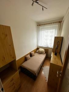 Ένα ή περισσότερα κρεβάτια σε δωμάτιο στο Apartmán Maňuš