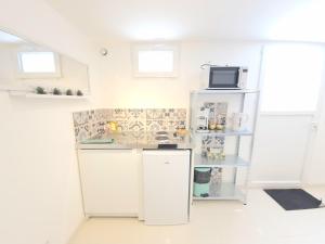 Η κουζίνα ή μικρή κουζίνα στο Proche gare, centre-ville et château de Blois +6 φωτογραφίες