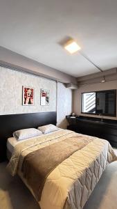 Ένα ή περισσότερα κρεβάτια σε δωμάτιο στο Suites Add Congonhas