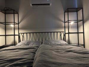Postel nebo postele na pokoji v ubytování Glamping Pod meruňkami