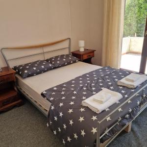 Postel nebo postele na pokoji v ubytování D&D Rooms