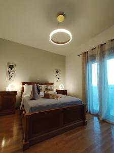 A bed or beds in a room at ISLAND Time Deluxe Apartment Downtown 3 floors
