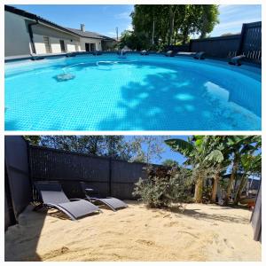 LéguevinにあるVilla entière avec piscine- 8pの家の隣に椅子2脚付きのスイミングプール