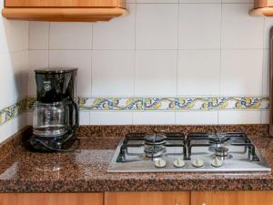 A kitchen or kitchenette at Lovely Apartment near Seabeach