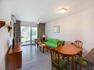 A seating area at Lovely Apartment near Seabeach