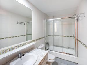 A bathroom at Lovely Apartment near Seabeach