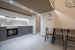 Kuchyň nebo kuchyňský kout v ubytování Loft 53- Urban Stay by MPS + 28 fotografií