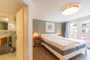 Voodi või voodid majutusasutuse Balmas Paradies-perfect family home toas