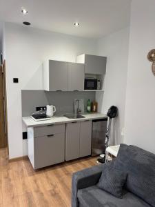 Kuchyň nebo kuchyňský kout v ubytování Quiet Apartments