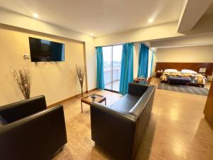 Postel nebo postele na pokoji v ubytování Hotel Esencia Suites