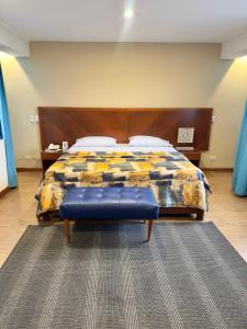Postel nebo postele na pokoji v ubytování Hotel Esencia Suites