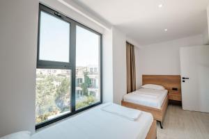 Postel nebo postele na pokoji v ubytování Hotel EN AD + 37 fotografií