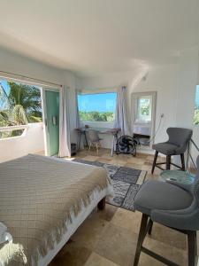 Posezení v ubytování Departamentos y cabañas a pie de playa -Baraka Beach Club