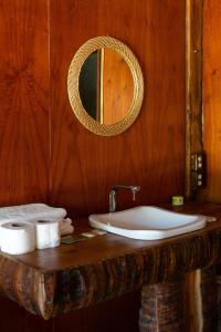 Koupelna v ubytování Departamentos y cabañas a pie de playa -Baraka Beach Club