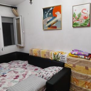 Postel nebo postele na pokoji v ubytování Apartman ElaBi