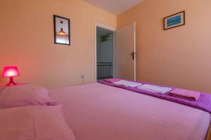 Posteľ alebo postele v izbe v ubytovaní Apartment in Crikvenica 5611