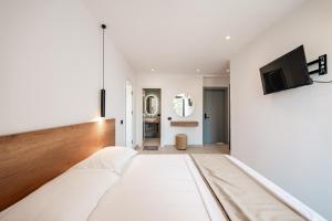 Postel nebo postele na pokoji v ubytování Hotel EN AD