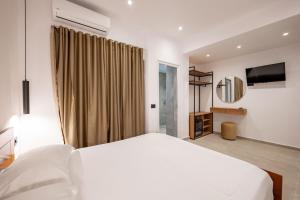Postel nebo postele na pokoji v ubytování Hotel EN AD