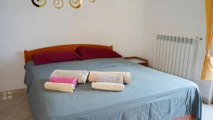 Ένα ή περισσότερα κρεβάτια σε δωμάτιο στο Castello's Rooms tropea
